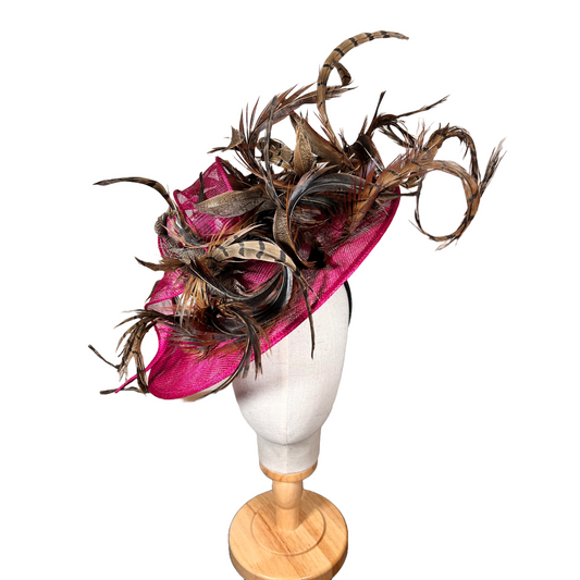 Vibrant pink feather fascinator