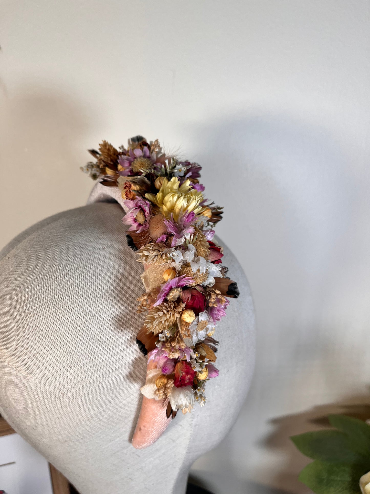 Light pink Alice band with feather and dried flowers
