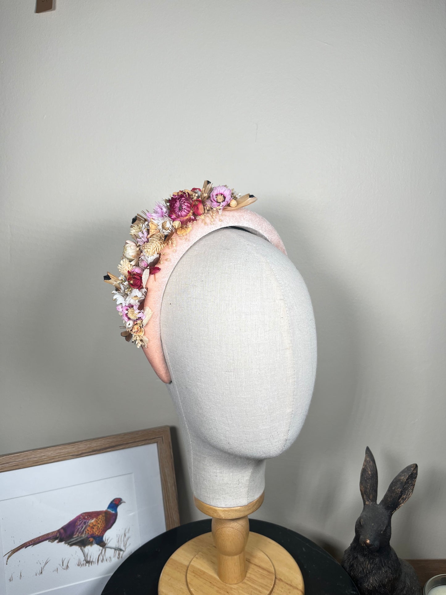 Light pink Alice band with feather and dried flowers
