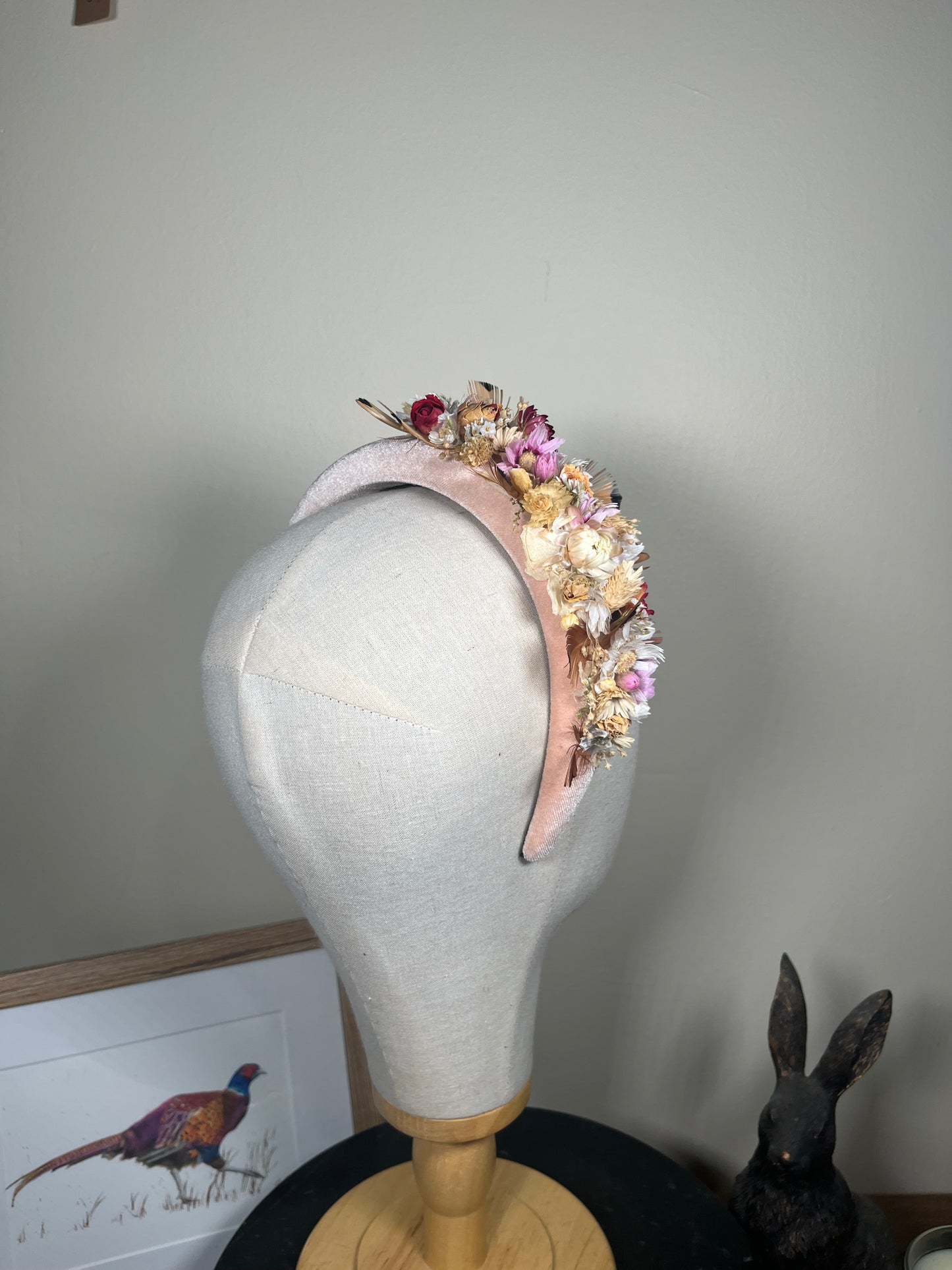 Light pink Alice band with feather and dried flowers